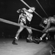 Jake LaMotta knocks down Sugar Ray Robinson. Photo credit: AP.